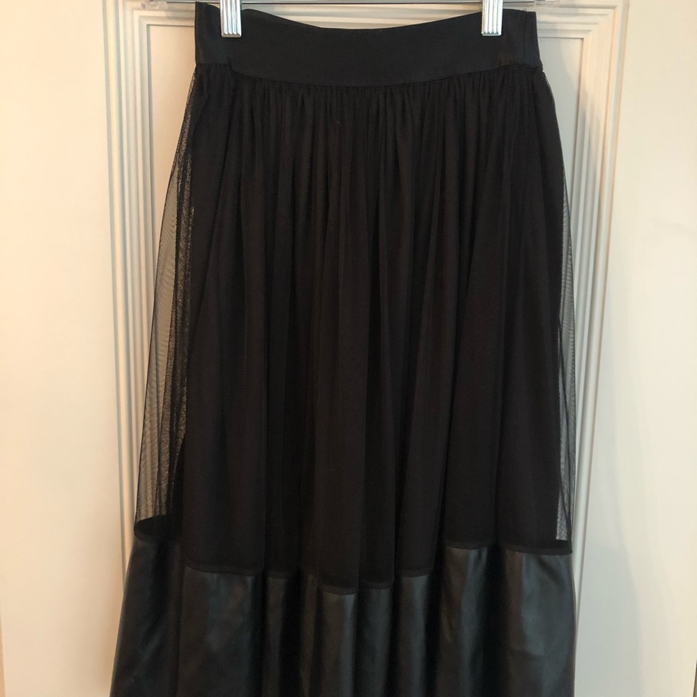 Lila clothing beautiful skirt with leather detail.